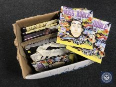 A box containing Ross Noble tour programmes and posters (posters signed)
