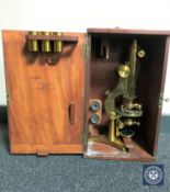 An early 20th century brass microscope by R & J Beck of London,