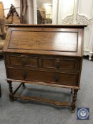 An oak barley twist bureau