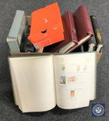 A box containing a large quantity of stamps and first day covers