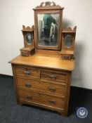 An Edwardian satin walnut dressing chest
