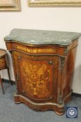 An ormolu mounted serpentine fronted marble topped side cabinet,