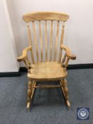 A pine farmhouse rocking chair