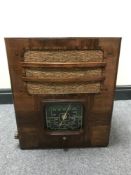 An Ultra walnut cased valve radio.