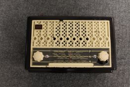 A Stella model number 1566 brown Bakelite cased radio.