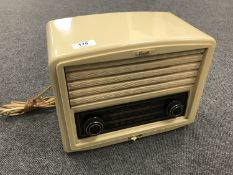 A Bush type VHF 90 cream cased radio.