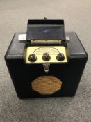 A Roberts Radio portable receiver.