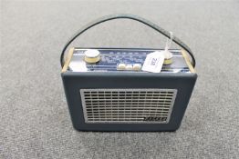 A vintage radio : Hacker Mini Herald in blue.