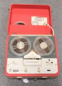 A Dansette consort portable tape recorder with original retail tag.