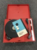 A Fidelity HF 42 Mini Player portable turntable with instruction booklet.