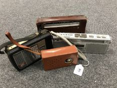 Four portable transistors : Standard TR 8, Philips D8000, Eagle Products hi/fi and a Perdio Curzon.