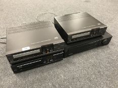 Three Philips CD players, CD104 together with a Sony SLV-E7 hi/fi stereo.