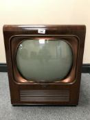 An Ultra V84 NF TV in walnut case.