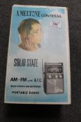 A Meltone Contessa solid state portable radio in original box.