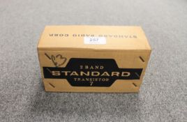 A Standard Transistor 7 two band radio in box.