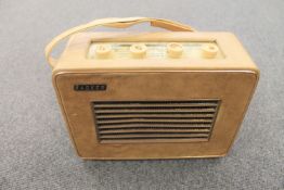 A vintage radio : Hacker Herald in cream case.