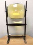 A Magnavista magnification lens on stand.