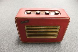 A vintage radio : Hacker Herald in red.
