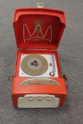 A Dansette portable turn table in red case.