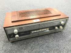 A Linnet & Laursen Piccolo 647 twelve transistor all wave radio.