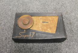 A Perdio Transistor 7 Super 7 portable receiver.