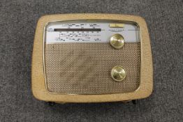 A vintage radio : Defiant receiver in two tone case.