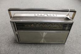 A Grundig Melody Boy 1000 transistor radio.
