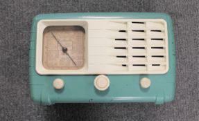 An Ultra radio in turquoise case.