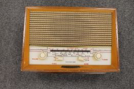A Dynatron teak cased transistor.