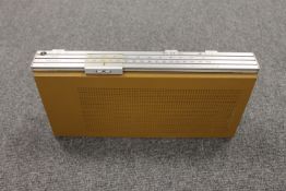 A Bang & Olufsen Beolit 400 portable receiver.