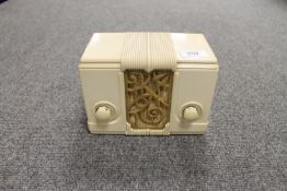 An early 20th century cream cased continental receiver.