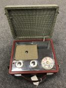 A Pye portable radio, red.