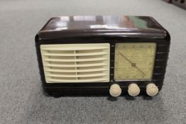 An Ulta Electric Limited Bakelite cased radio.