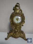 A continental gilt metal Rococo style mantel clock
