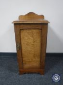 An early 20th century pot cupboard