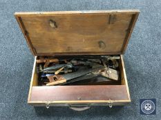 A joiner's tool box containing hand tools