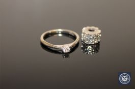A 9ct white gold diamond solitaire ring, size O,