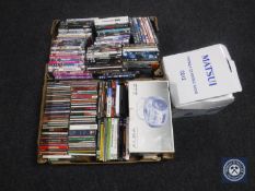 Two boxes of CD's and DVD's,