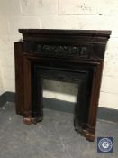 A Victorian cast iron fire insert