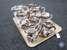 A tray of eight Masons Mandalay and Mandarin jugs