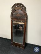 A late 19th century mahogany arched topped hall mirror