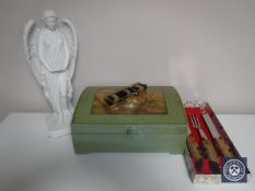 A Tunbridge ware crumb brush together with a figure of an angel,