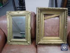 A Victorian gilt and gesso frame and a gilt framed mirror