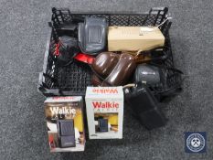 A box of walkie talkies, cameras and accessories,