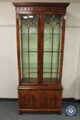 A Bevan Funnell mahogany glazed display cabinet, width 79 cm.