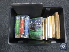 A box of books by JRR Tolkein,