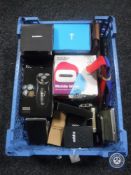 A basket of Zippo lighters, dart cases, leather wallet,