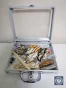 A small display case of military badges, Empire pocket watch, lady's watch,