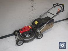 A Honda HRH 536 petrol lawn mower with grass box