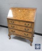 A burr walnut bureau